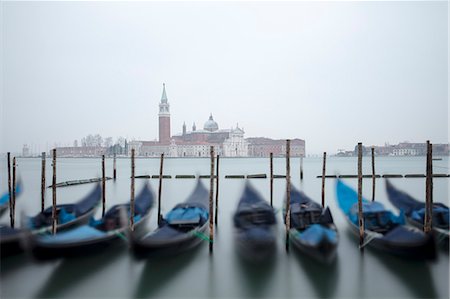 Gondolas in the mist with the Church of San Giorgio Maggiore in the background, Venice, UNESCO World Heritage Site, Veneto, Italy, Europe Stock Photo - Premium Royalty-Free, Code: 6119-09156560