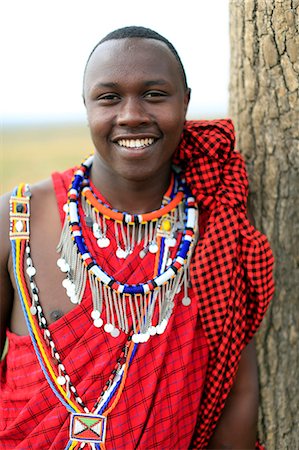 simsearch:649-06433219,k - Portrait of a Masai man wearing colorful traditional clothes, Masai Mara Game Reserve, Kenya, East Africa, Africa Stock Photo - Premium Royalty-Free, Code: 6119-09101903