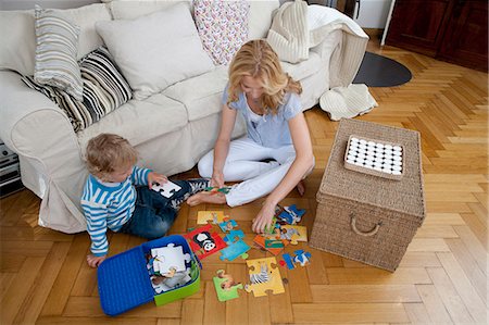 simsearch:649-03770663,k - Woman playing on floor with son Stock Photo - Premium Royalty-Free, Code: 6122-07692006