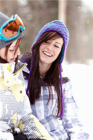 Teen girls in snowboard clothing Stock Photo - Premium Royalty-Free, Code: 6122-07693687