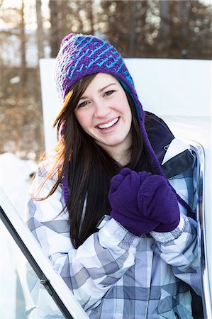 Teen girl by car in winter Stock Photo - Premium Royalty-Free, Code: 6122-07693689