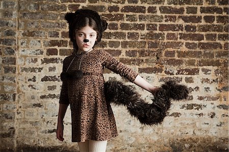 simsearch:614-03469543,k - Young girl dressed up as cat Stock Photo - Premium Royalty-Free, Code: 6122-07694479