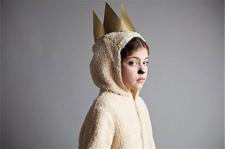 simsearch:614-03469543,k - Young girl dressed up as sheep, wearing gold crown Stock Photo - Premium Royalty-Free, Code: 6122-07694493