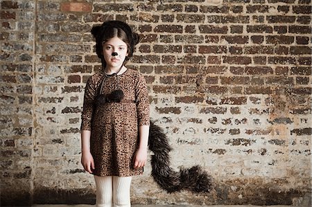 simsearch:614-03469543,k - Young girl dressed up as cat Stock Photo - Premium Royalty-Free, Code: 6122-07694491