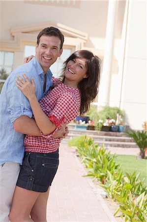 Happy couple in garden Stock Photo - Premium Royalty-Free, Code: 6122-07694942