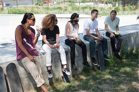 Skateboarders taking a break Stock Photo - Premium Royalty-Free, Code: 6122-07695202