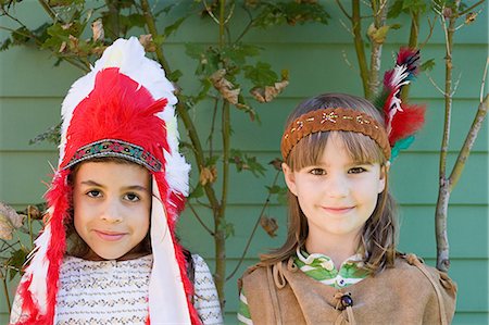 simsearch:6122-07698204,k - Two girls in Native American costumes Stock Photo - Premium Royalty-Free, Code: 6122-07695876