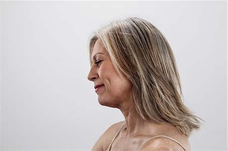 Mature woman, side view Stock Photo - Premium Royalty-Free, Code: 6122-07698235