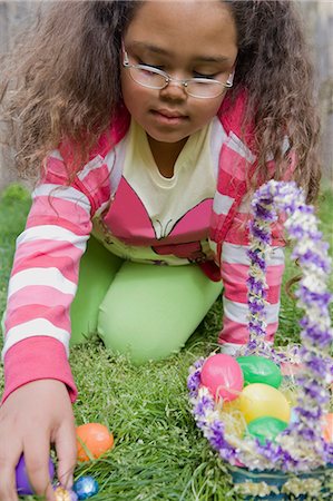 simsearch:6122-07698204,k - Girl finding easter eggs in grass Stock Photo - Premium Royalty-Free, Code: 6122-07698488