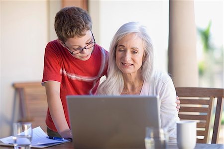 simsearch:6113-06753677,k - Grandmother and grandson using laptop Stock Photo - Premium Royalty-Free, Code: 6122-07700761