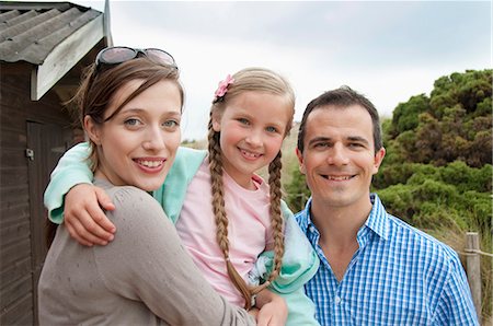 Family standing together outdoors Stock Photo - Premium Royalty-Free, Code: 6122-07701161