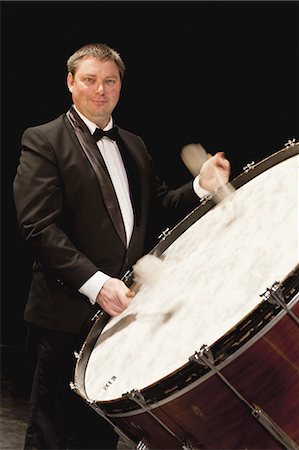 rhythm - Bass drum player in orchestra Stock Photo - Premium Royalty-Free, Code: 6122-07702093