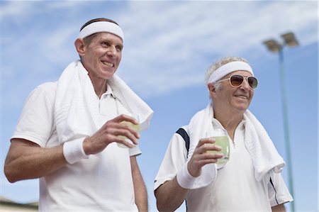 Older men drinking lemonade outdoors Stock Photo - Premium Royalty-Free, Code: 6122-07702124