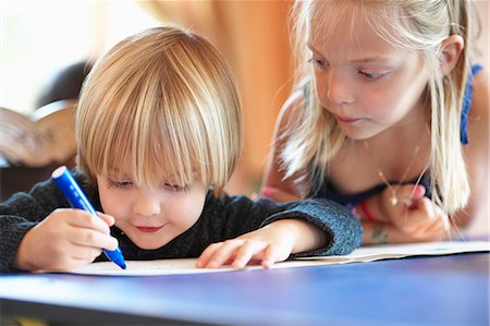 simsearch:649-01696512,k - Close up of children drawing indoors Stock Photo - Premium Royalty-Free, Code: 6122-07703043