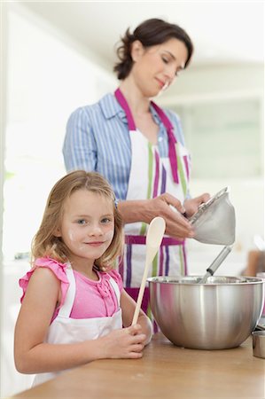 Mother and daughter baking in kitchen Stock Photo - Premium Royalty-Free, Code: 6122-07703071