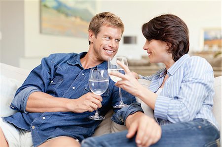 simsearch:6113-07790495,k - Couple toasting each other with wine Stock Photo - Premium Royalty-Free, Code: 6122-07703080