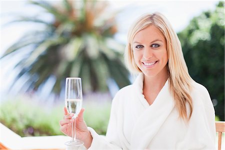 simsearch:6113-07790529,k - Woman in bathrobe relaxing outdoors Stock Photo - Premium Royalty-Free, Code: 6122-07703101
