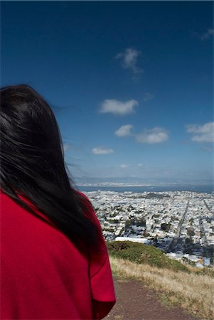 simsearch:614-07806265,k - Woman on hill overlooking cityscape Stock Photo - Premium Royalty-Free, Code: 6122-07703362
