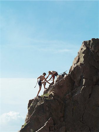 rock climber (male) - Rock climbers scaling steep rock face Stock Photo - Premium Royalty-Free, Code: 6122-07703741