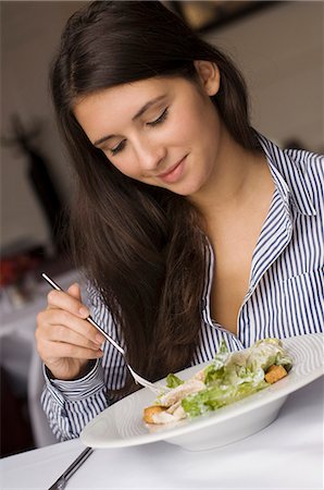 simsearch:614-07806265,k - Girl having plate of food in cafe Stock Photo - Premium Royalty-Free, Code: 6122-07703798