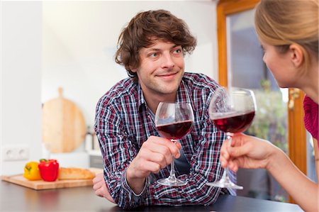 simsearch:649-05556305,k - Couple toasting each other with wine Stock Photo - Premium Royalty-Free, Code: 6122-07704300