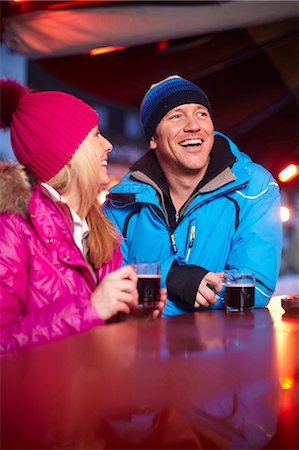 simsearch:6122-07704462,k - Couple having coffee outdoors in winter Stock Photo - Premium Royalty-Free, Code: 6122-07704461