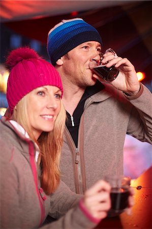 simsearch:6122-07704462,k - Couple having coffee outdoors in winter Stock Photo - Premium Royalty-Free, Code: 6122-07704462