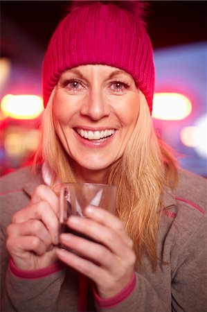 simsearch:6122-07704462,k - Woman drinking cup of coffee Stock Photo - Premium Royalty-Free, Code: 6122-07704464