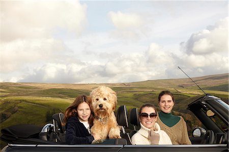 dog car - Family driving in rural landscape Stock Photo - Premium Royalty-Free, Code: 6122-07704421