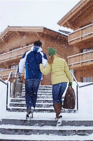 simsearch:6122-07704462,k - Couple walking together in snow Stock Photo - Premium Royalty-Free, Code: 6122-07704500