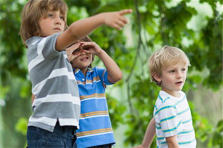 point - Boys playing together outdoors Stock Photo - Premium Royalty-Free, Code: 6122-07705097