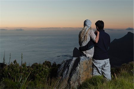 simsearch:614-06625125,k - Couple overlooking coastal view Stock Photo - Premium Royalty-Free, Code: 6122-07705025