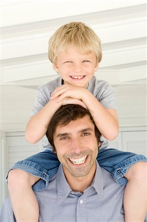 simsearch:649-05649029,k - Father carrying son on shoulders Stock Photo - Premium Royalty-Free, Code: 6122-07705565