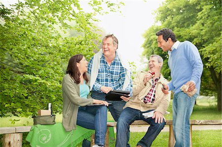 simsearch:614-07806265,k - Friends using tablet computer in park Stock Photo - Premium Royalty-Free, Code: 6122-07705617