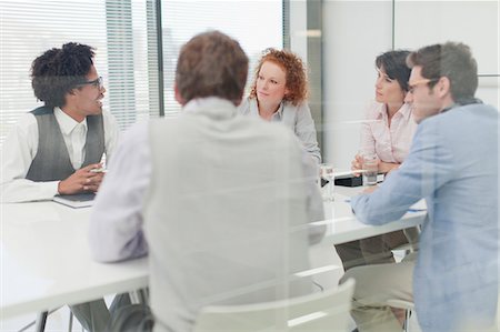 simsearch:649-06000952,k - Business people talking in meeting Stock Photo - Premium Royalty-Free, Code: 6122-07705701