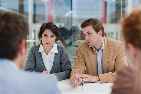 simsearch:649-06000952,k - Business people talking in meeting Stock Photo - Premium Royalty-Free, Code: 6122-07705713