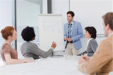 simsearch:649-06000952,k - Business people talking in meeting Stock Photo - Premium Royalty-Free, Code: 6122-07705714