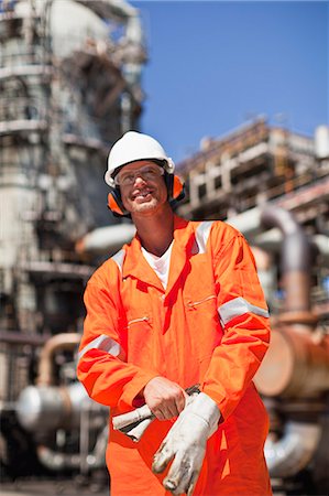 simsearch:649-06040489,k - Worker with gloves at oil refinery Stock Photo - Premium Royalty-Free, Code: 6122-07706233