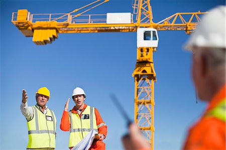 simsearch:649-06040720,k - Workers talking at construction site Stock Photo - Premium Royalty-Free, Code: 6122-07706357