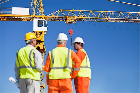 simsearch:649-06040720,k - Workers talking at construction site Stock Photo - Premium Royalty-Free, Code: 6122-07706356