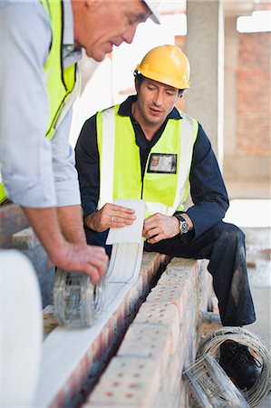 simsearch:649-06040720,k - Construction worker on building site Stock Photo - Premium Royalty-Free, Code: 6122-07706390