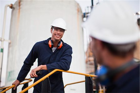 simsearch:649-06040489,k - Workers talking at chemical plant Stock Photo - Premium Royalty-Free, Code: 6122-07706319