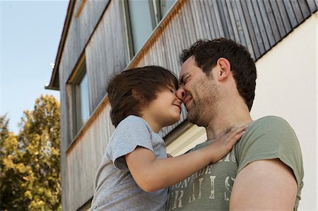 simsearch:632-03848361,k - Father and son playing outdoors Stock Photo - Premium Royalty-Free, Code: 6122-07706676