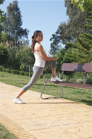simsearch:649-04247797,k - Runner stretching on park bench Stock Photo - Premium Royalty-Free, Code: 6122-07707173