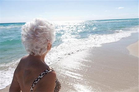 senior citizens women in bathing suits - Senior Woman on the beach Stock Photo - Premium Royalty-Free, Code: 6122-08211844