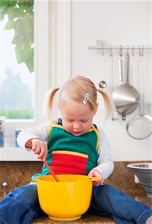 simsearch:649-05520883,k - Toddler girl mixing ingredients Stock Photo - Premium Royalty-Free, Code: 6122-08212009