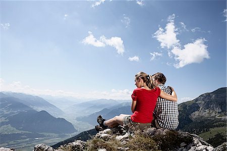 Couple admiring rural landscape Stock Photo - Premium Royalty-Free, Code: 6122-08229192