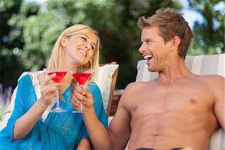 simsearch:400-05686653,k - Couple toasting each other outdoors Stock Photo - Premium Royalty-Free, Code: 6122-08229492