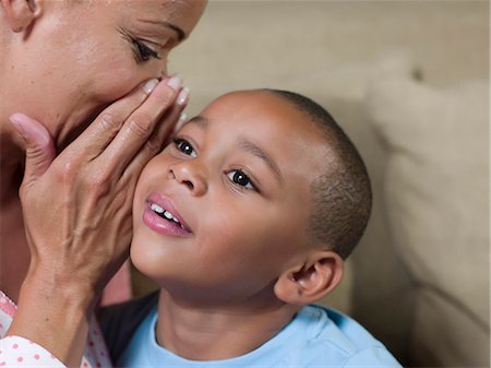 phoenix (arizona) - Close up of mother whispering to son Stock Photo - Premium Royalty-Free, Code: 6122-08229707