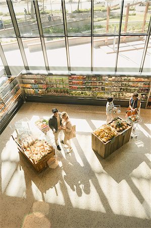 High angle view people grocery shopping in market Stock Photo - Premium Royalty-Free, Code: 6124-09004886